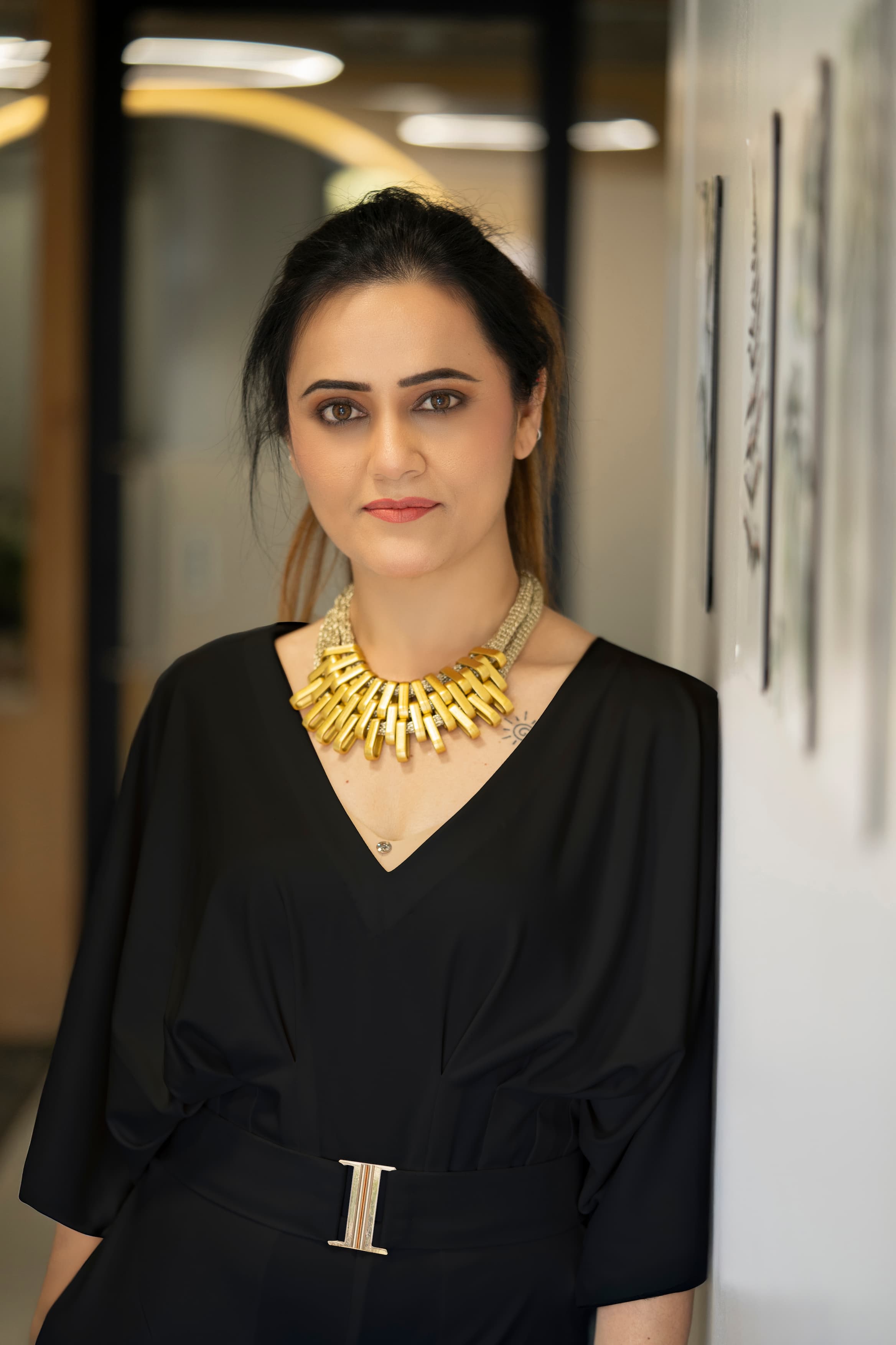 black jumpsuit with belt