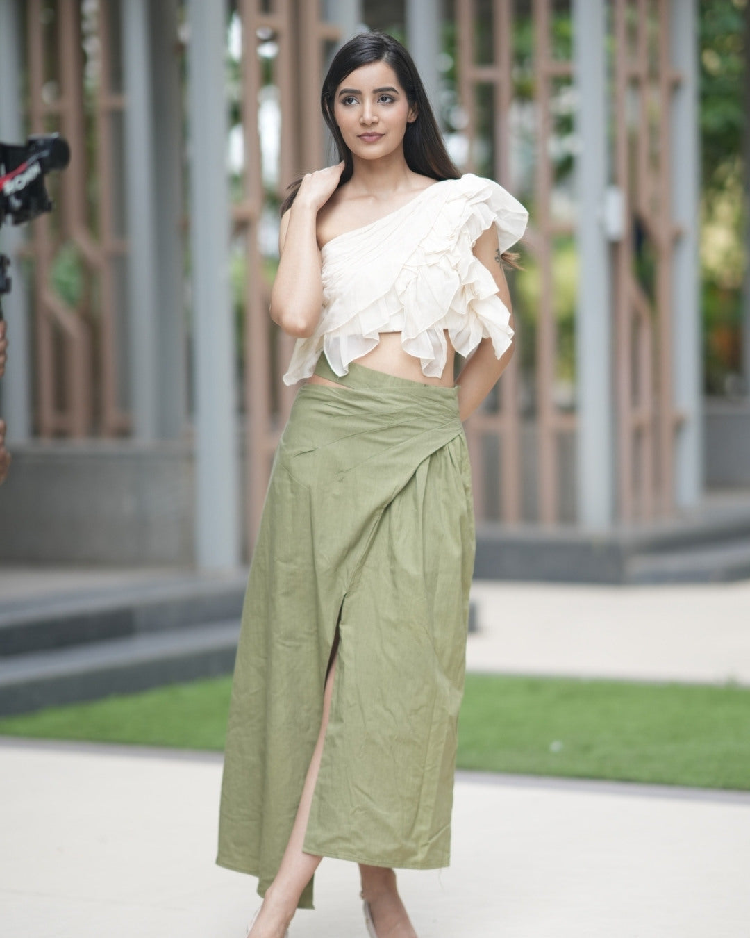 Yellow ruffle top with olive skirt